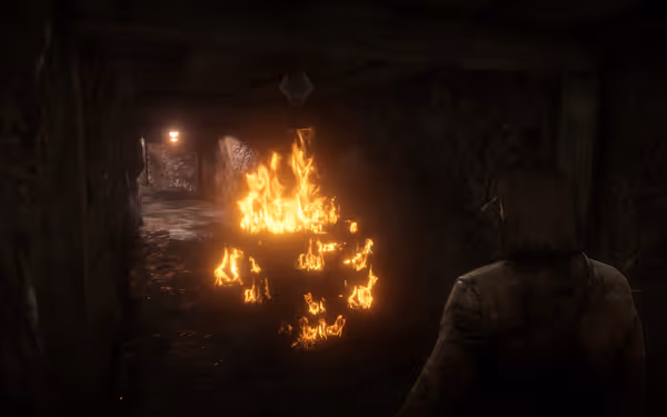 A male character with long hair stands before a fiery blaze in a dim underground tunnel.