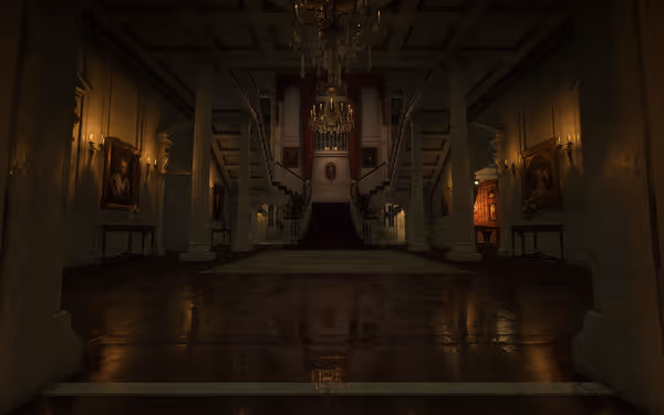 A dimly lit mansion foyer with twin staircases, marble columns, and a central chandelier.