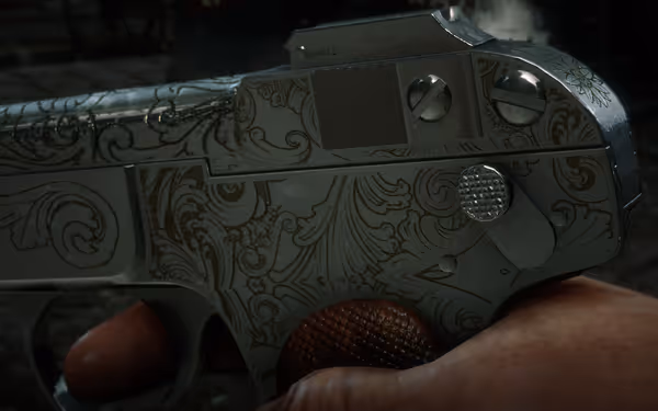 A hand grasps an ornate revolver adorned with intricate floral engravings.