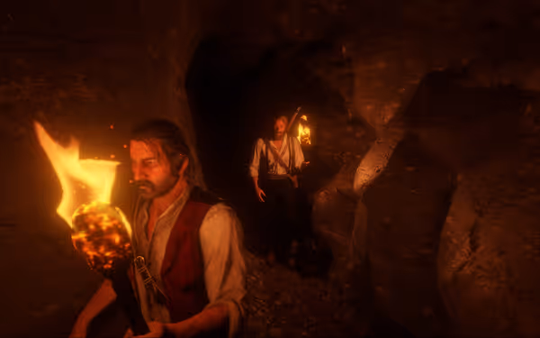 Two men holding torches, walking in a dark cave with rocky walls