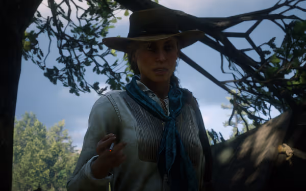 Women in hat and scarf, holding cigarette, under tree branches.