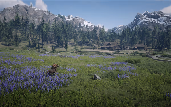 A rider on horseback traverses a field of purple flowers with mountains and cabins nearby.