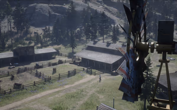 A scenic rural farmstead with fenced enclosures, barns, and a windmill foreground.