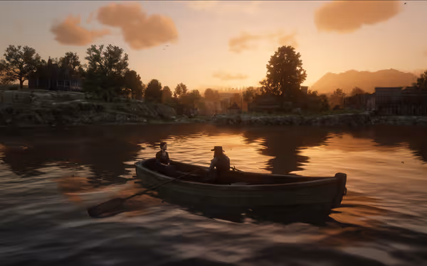 Two people sit in a wooden rowboat on a reflective river at sunset.