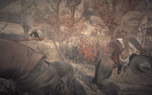 Two men are shot and falling, with blood spraying, while another approaches armed.