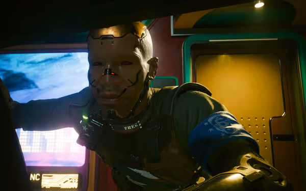 A cybernetic soldier with a golden mask and glowing red eyes leans forward menacingly.