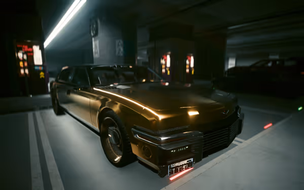 A futuristic gold-plated luxury car with a sleek design is parked in a dim garage.