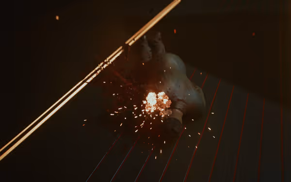 A restrained figure is struck by a deadly laser trap, causing sparks and blood