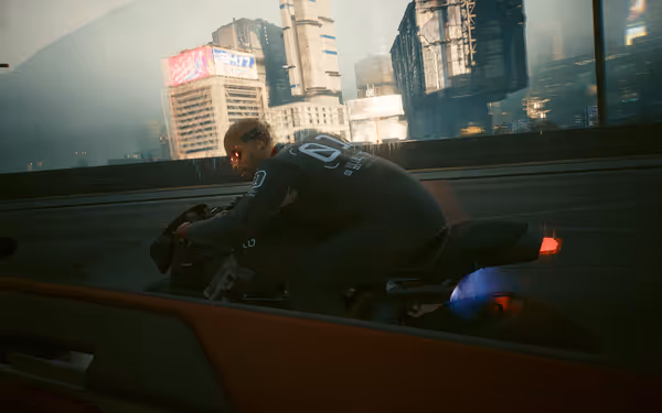 A cybernetic biker with glowing red eyes rides a futuristic motorcycle in a neon-lit city.