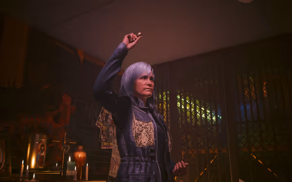 A silver-haired woman in a leather vest raises a small object near an altar