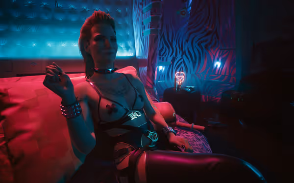 A stylish woman in leather sits on a neon-lit couch in a futuristic room