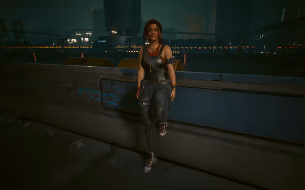 A woman with red hair leans on a graffiti-covered barrier in a futuristic city.