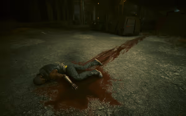 A man with a robotic arm lies dead on the ground, leaving a blood trail.