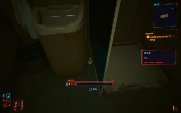 A dimly lit bathroom with a trash bin and drugs found near the shower.