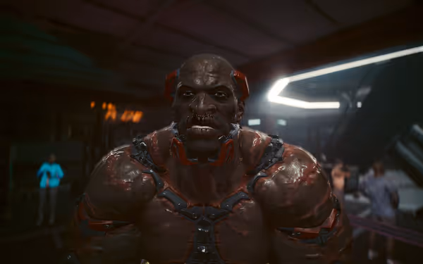 A massive cybernetic man with glowing implants and damaged skin glares intensely forward