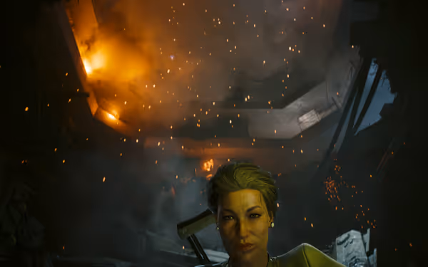A woman with short hair stands calmly as fires burn and debris falls above her.