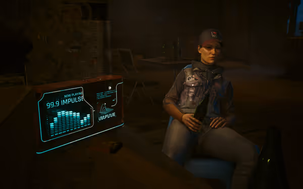 A woman in a cap holds a bottle beside a radio showing the station 99.9 Impulse.