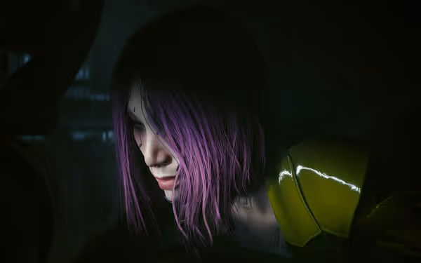 A woman with purple hair and yellow armor looks down in dramatic low lighting.