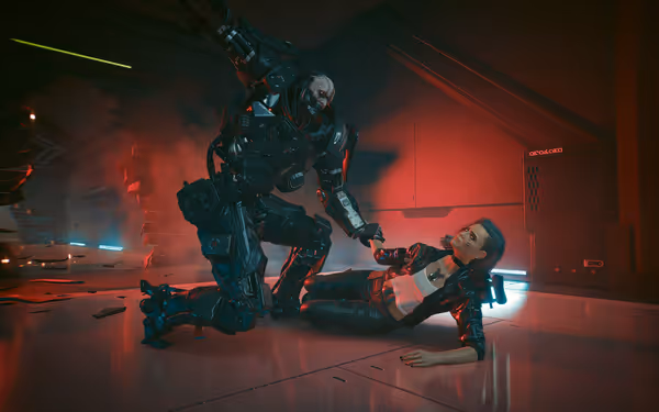 A large cybernetic soldier grabs a wounded woman lying on the floor in red light.