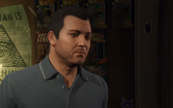 A man with a serious expression stands indoors near posters and collectible action figures.