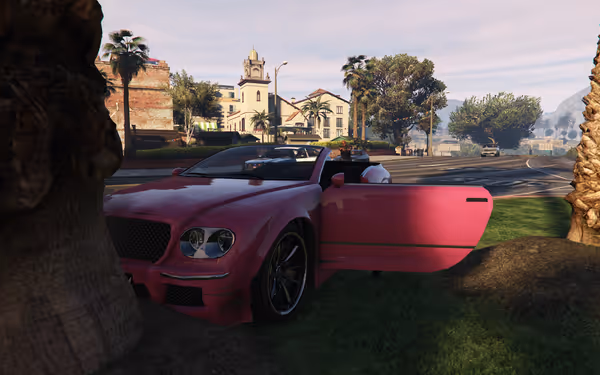 A pink convertible car is parked on the roadside with its door open.