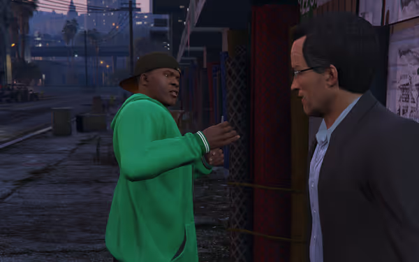 A man in a bright green hoodie talks closely to another man in a suit on a sidewalk.