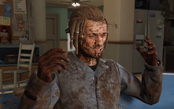 A person with dreadlocks and blistered muddy skin raises hands in a cluttered kitchen with posters and fridge