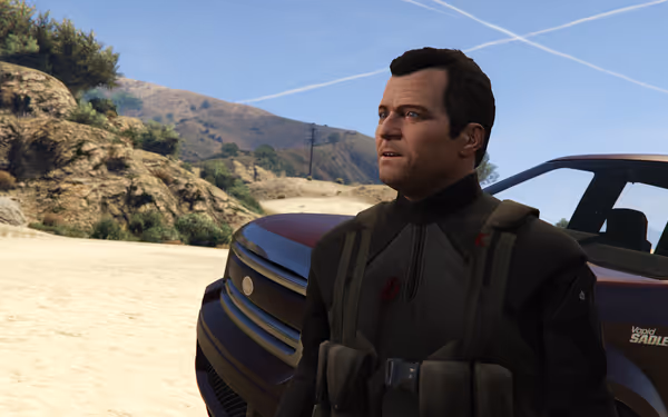 A man in tactical gear with a chest wound stands near an SUV in the desert.