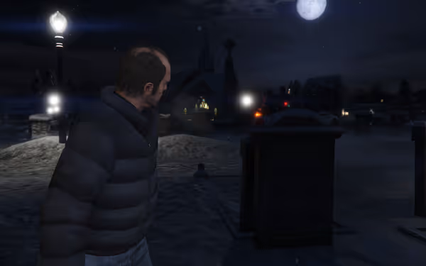 A man in a puffer jacket stands in a snowy graveyard under a full moon.