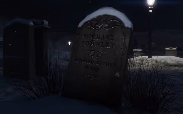 A snow-covered gravestone at night reads "Michael Townley, husband, father, friend, 1965-2004".