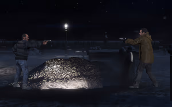 Two men point guns at each other across a snowy grave at night outdoors.