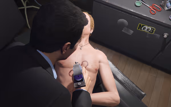 A man in a suit gives a shirtless person a tattoo on their chest indoors.
