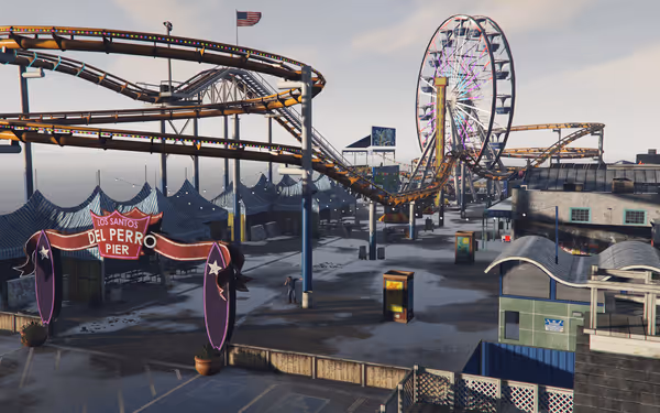 A large amusement pier with roller coaster tracks, Ferris wheel, and the DEL PERRO PIER sign.