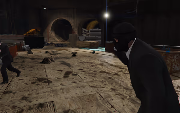 A man in a black suit and mask stands in a tunnel construction site with rubble.