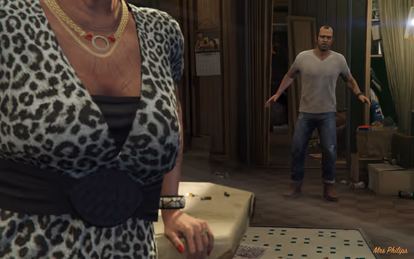 A man stands shocked in a cluttered room while a woman faces him closely.