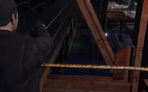 A man is aiming a gun from a walkway, targeting a figure below in a dark industrial setting.