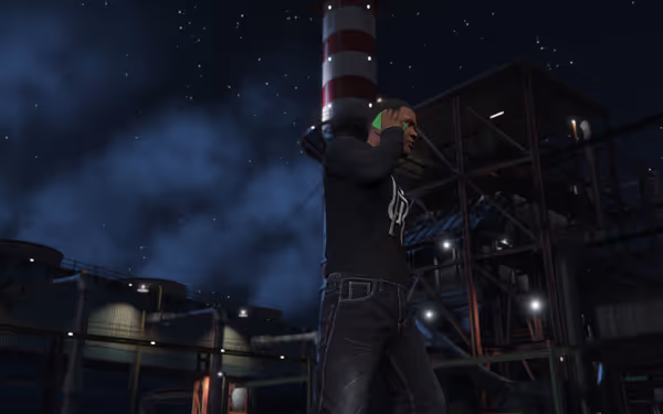 The image shows a man on the phone at night, with industrial structures and stars above.