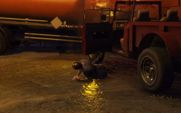 A wounded man crawls on the ground beside an open red jeep at night.