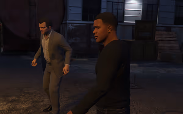 Two men walk, one in a suit and the other in a black shirt.