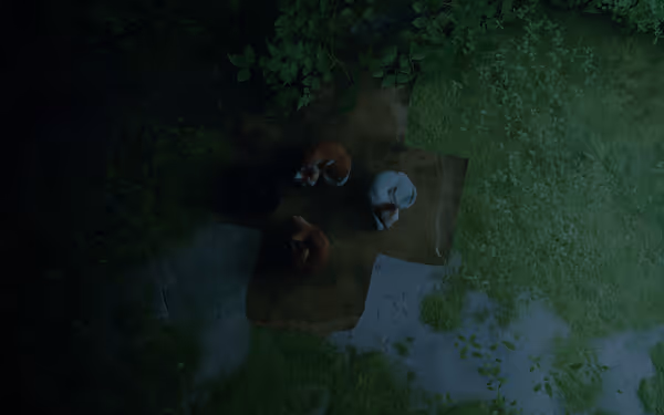 Four cats are curled up sleeping on a piece of cardboard amid greenery.