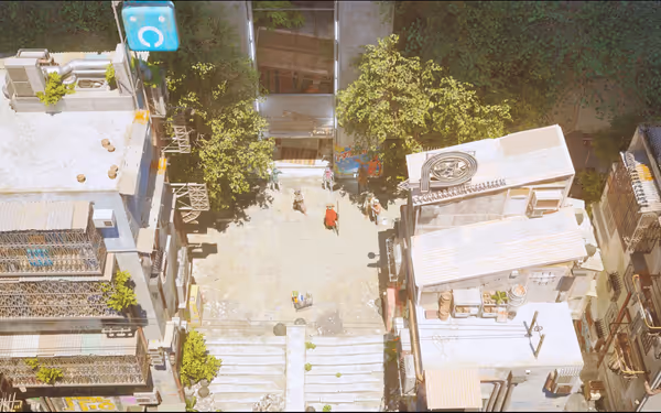 The image shows a small urban area with crowded buildings, greenery, and several people walking.